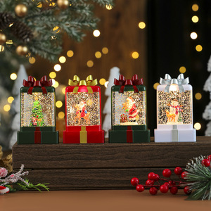 Nuevo set de regalo de Navidad con luz nocturna, vela, lámpara y adorno, estilo comercio electrónico transfronterizo, con agua y luz brillante, pequeño regalo. - Product Image 2
