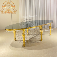 Nouveau modèle de table à manger de forme ovale en verre avec cadre en acier inoxydable et miroir pour événement de mariage ensemble de chaises
