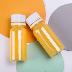 Botella de jengibre transparente sin BPA con pegatina de envoltura retráctil Mini botella de jugo de plástico - Product Image 6