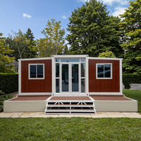 Appartement en conteneur préfabriqué de luxe moderne Villa portable modulaire alimentée par panneau solaire vie urbaine pour immeuble de bureaux acier