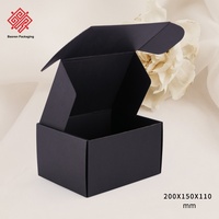 Boîte d'expédition en carton ondulé noir personnalisée, boîte pliante recyclée pour l'emballage de vêtements et de cadeaux e-commerce