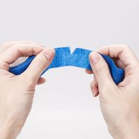 Bandage cohésif auto-adhésif de premiers soins déchirable Enveloppe élastique en gros par déchirure Protection sûre du joint de la main pour toutes les conditions