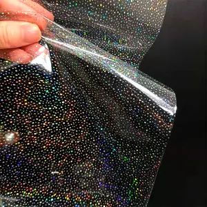 Película no tóxica transpirable brillante con efecto láser para hacer bolsos, ropa, alfombrilla, funda, TPU, transparente