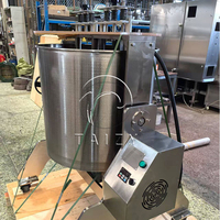 Machine de traitement automatique du chocolat pour le chocolat noir et la pâte de noix