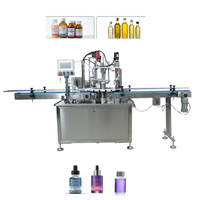 Machine de remplissage et de bouchage rotative à 4 têtes haute performance 5 kW pour liquides buvables, sirops, huiles comestibles, boissons, bouteilles de détergent