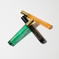 Flacon de parfum vide transparent brillant personnalisé de 10 ml avec bouchon cylindrique noir doré, mini flacon vaporisateur de parfum avec boîte d'emballage personnalisable
