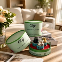 Boîte en carton ronde de luxe avec logo personnalisé, tube en papier cylindrique vert de haute qualité pour l'emballage de flacons de parfum et d'huiles essentielles