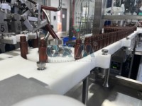 Machine de lavage de bouteilles rotative automatique industrielle à 32 buses pour ligne de production d'emballages de boissons