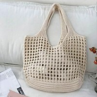 Bolso de playa tejido a mano de alta calidad para mujer, diseño sencillo, bolsos de mano elegantes huecos para mujer con logotipo impreso personalizado