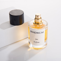 Flacon de parfum minimaliste haut de gamme de 50 ml en verre transparent avec vaporisateur et bouchon en chêne