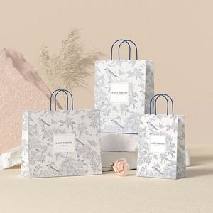 Sac de shopping en papier kraft personnalisé imprimé de luxe classique durable avec poignées en ruban - Product Image 6