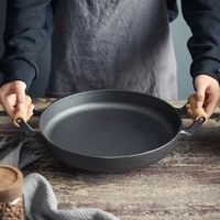 Plaque de cuisson plate en fonte polyvalente de qualité alimentaire, poignées en bois détachables, vente directe usine OEM ODM pour barbecue