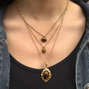 สร้อยคอจี้ลายตาเสือสำหรับฤดูใบไม้ร่วงและฤดูหนาว ทำจากสแตนเลสสตีล 18K ดีไซน์รูปทรงวงรีเรขาคณิต เหมาะสำหรับใส่ทุกวัน เครื่องประดับหรูหราแบบเรียบง่าย - Product Image 2