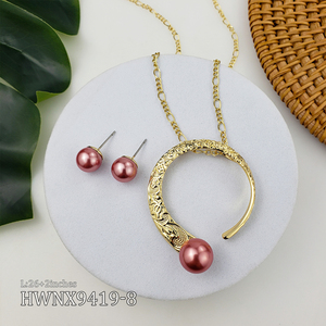 Ensemble de boucles d'oreilles et de collier en gros, en cuivre plaqué or, style hawaïen, motif de défilement élégant - Product Image 6