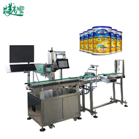 Machine de marquage laser de précision pour marquer le dessus et le dessous des boîtes de lait en poudre, permettant une fonction de traçabilité individuelle des produits entièrement intégrée en ligne.