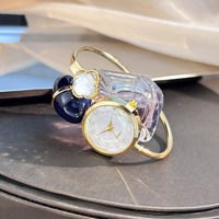 Montre de luxe pour femme avec bracelet en nacre Cadran de bijouterie ouvert compact Niche Type de breloque accessible