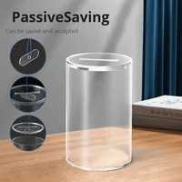 Vente en gros Banque ronde en acrylique pour enfants Banque transparente transfrontalière avec couvercle Présentoir Tirelires Économiser de l'argent