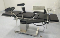 Table d'opération électrique réglable en hauteur (700-1000 mm) avec base en acier inoxydable 304, antibactérienne et facile à nettoyer