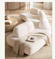 Ensemble de canapés de salon de luxe Isola OEM au design italien saisissant, fabriqué artisanallement, garni d'éponge, revêtement en tissu, capitonné en coin