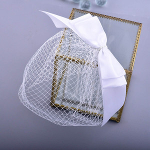 Genya Hot Selling Bow Voile de mariée <span class=keywords><strong>Accessoires</strong></span> pour <span class=keywords><strong>cheveux</strong></span> Voile de mariée en tulle simple pour femmes Voile de <span class=keywords><strong>cheveux</strong></span> <span class=keywords><strong>courts</strong></span> pour la fête de <span class=keywords><strong>mariage</strong></span> - Product Image 1