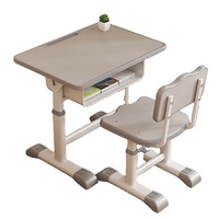 Bureau et chaise d'étudiant à dossier ondulé avec rangement 65x45cm, étagère réglable 33-44cm, fente pour crayons, chaise et bureau d'école OEM
