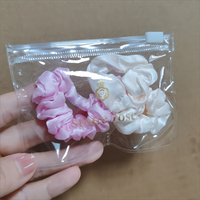Emballage de bijoux avec impression de logo personnalisé sac à poussière pochettes de boucles d'oreilles en plastique givré avec fermeture à glissière pour accessoires de collier