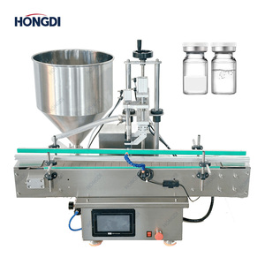 Llenadora semiautomática de jugo de naranja de un solo cabezal para el llenado de líquidos en la industria de alimentos y bebidas. - Product Image 1