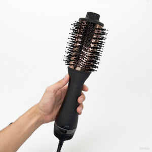 Secador de pelo térmico con revestimiento cerámico de 1200W, herramienta de estilismo en caliente con voluminizador de un paso para uso doméstico - Product Image 1