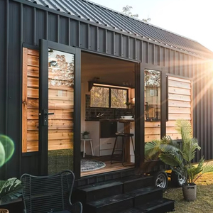 Petite maison 2 chambres sur roues Maison mobile préfabriquée à cadre en acier léger pour la vie en plein air - Product Image 2