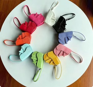 Mini bolso de sillín, monedero, estuche creativo para auriculares, llavero de moda para coche, estuche para auriculares con correa de reloj - Product Image 2