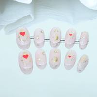 Uñas artificiales, uñas hechas a mano de alta gama, forma de uña ovalada pequeña, estilo de Luna pequeña en forma de corazón, reutilizables, venta al por mayor de fábrica.