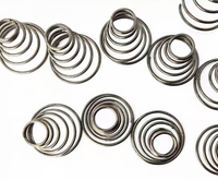 Le fil plat cylindrique d'acier au carbone à haute résistance de force tous dactylographient les ressorts à haute résistance de diverses tailles de tour de bobine en métal flexible