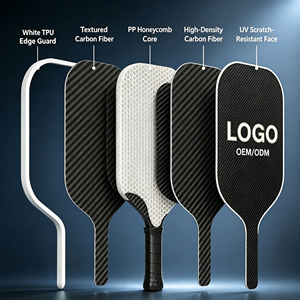 Ensemble <span class=keywords><strong>de</strong></span> raquettes <span class=keywords><strong>de</strong></span> pickleball en titane et carbone, directement <span class=keywords><strong>de</strong></span> l'usine, 2 raquettes, 4 balles, 1 sac, <span class=keywords><strong>jeux</strong></span> <span class=keywords><strong>de</strong></span> terrain extérieur, fournisseur en gros - Product Image 1
