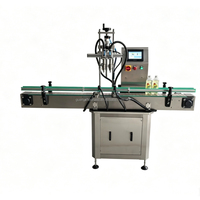 Machine de remplissage à pompe magnétique à double tête servo-électrique pour liquides et pâtes, idéale pour le remplissage de produits chimiques liquides.