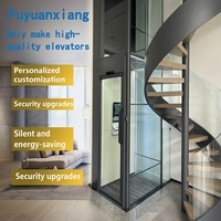 Ascenseur hydraulique à dos à deux étages pour intérieur avec portes manuelles, vitrage panoramique, construction en acier inoxydable, design contemporain