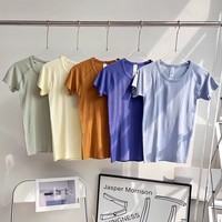 T-shirt à manches courtes de sport d'entraînement de gymnastique à séchage rapide pour femmes Logo personnalisé haut de Yoga sans couture vêtements équestres Logo de Fitness