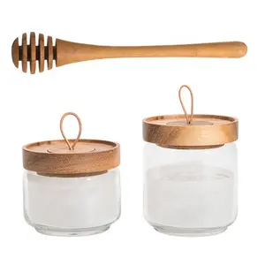 Formato differente vuota trasparente 125ml 4 once di vetro borosilicato miele delle api vasi con coperchi di legno di bambù