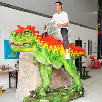 Manège de dinosaure animatronique réaliste pour enfants dans un parc d'attractions