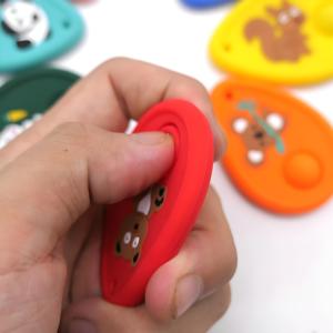 Jouets de décompression en silicone pour enfants, pierres sensorielles de décompression pour la paume de la main, idéales comme cadeaux pour les fêtes et les fournitures de vacances - Product Image 1