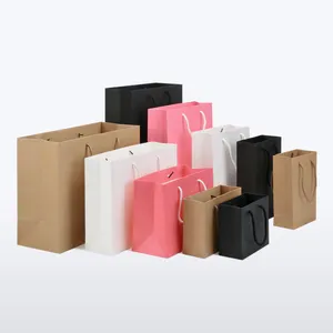 Luxury Pink Ribbon Handle Cardboard Shopping Packaging Bag Customized Embossed Gold Foil Paper Gift Bags With Logo