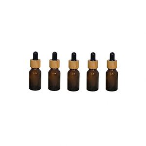 Hot Sale 20ml-120ml Frosted Matte Amber Cylinder Glass <b>Dropper</b> <b>Bottle</b> with Bamboo Lid - Product Image 1