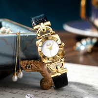 Montre pour femme GEDI de haute qualité, montre-bracelet à quartz rétro à cadran rond, élégante, avec bracelet en cuir et design étanche.