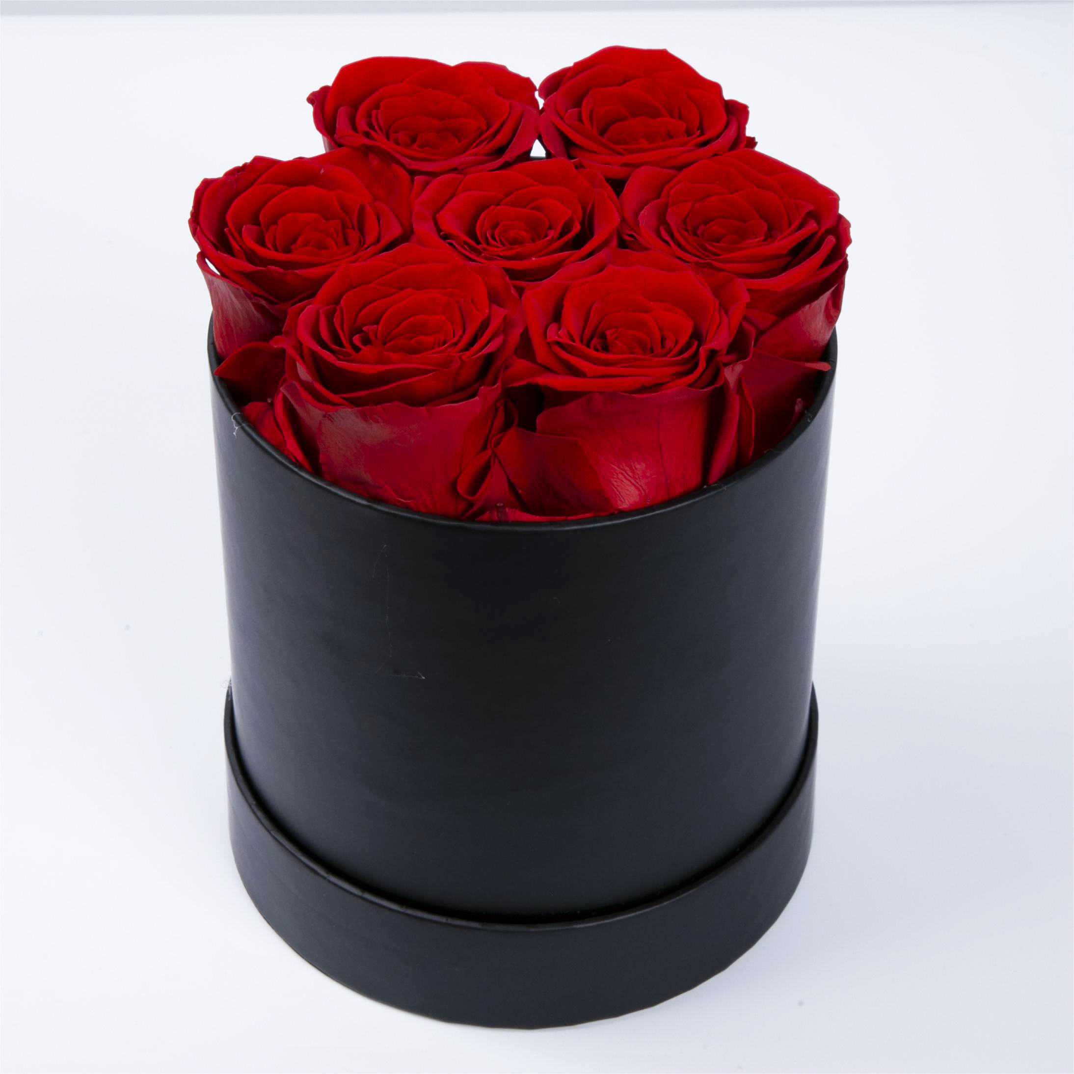 7 Roses In Round Box