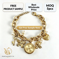 Montre-bracelet vintage élégante en alliage avec breloques pour femme, montre-bracelet à quartz rétro avec papillon et cœur, vente en gros de bijoux-montres