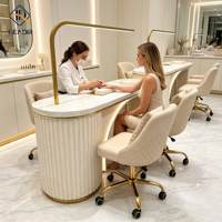 Table de manucure individuelle moderne avec plateau en marbre et lampe à ongles intégrée, durable pour salon de manucure