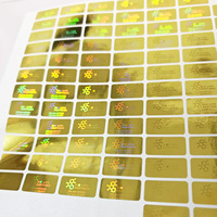 Étiquettes imperméables autocollantes holographiques avec logo laser personnalisé pour l'étiquetage des emballages