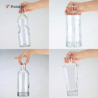 Penjualan terlaris grosir botol kaca tangan malaikat 500 ml dengan tutup gabus untuk wiski minuman keras dan Vodka