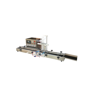 Machine de remplissage de liquides semi-automatique en acier inoxydable de haute qualité avec convoyeur pour le remplissage d'huile dans les sacs en verre - Product Image 1