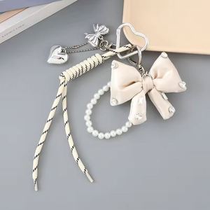 Creative Gift PU Leather Korean Bow <b>Key</b> <b>Chains</b> Bow Tassel Keyring Bag Accessories Pendant Cheer Bow Keychain - Product Image 5