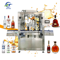 Machine de remplissage et d'embouteillage automatique à pression négative pour le Cognac Hennessy, la Tequila Don Julio, le Whisky Jack Daniel's